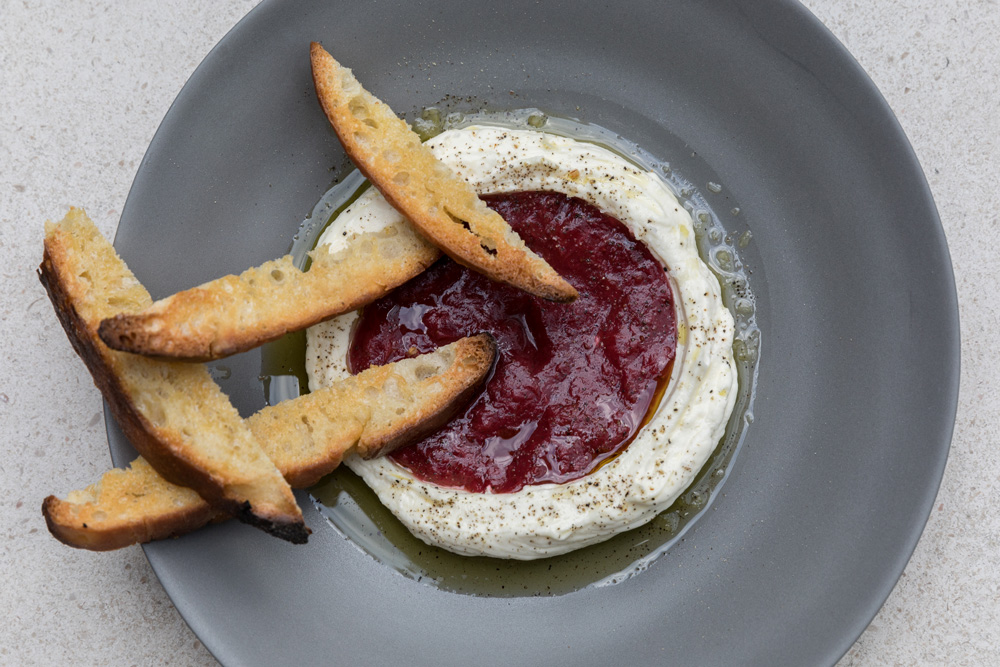 Housemade ricotta with strawberry jam from Mercato 